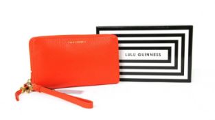 A Lulu Guinness 'Beauty Spot' Continental red leather purse,