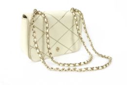 A Tory Burch cream leather shoulder bag