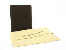 A Louis Vuitton brown taiga leather desk agenda cover