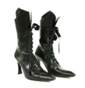 A pair of Michel Perry black leather lace-up boots,