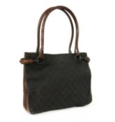A Gucci dark brown canvas curved handle bag