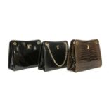 A Cartier black crocodile leather shoulder bag,