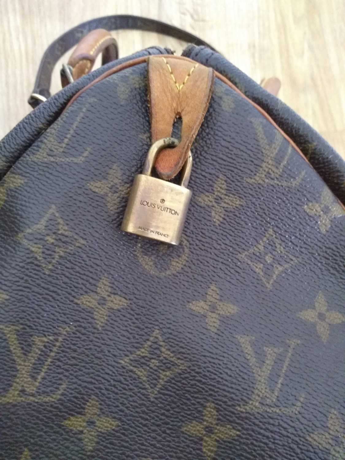 A Louis Vuitton monogrammed canvas 'Speedy 30' bag, - Image 7 of 7