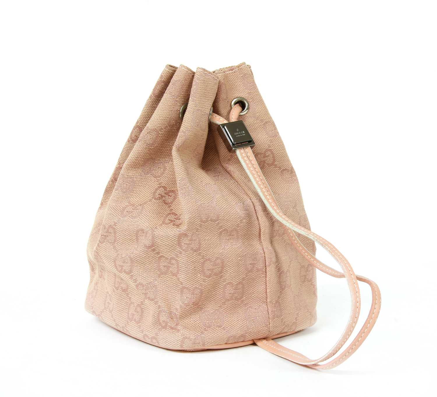 A Gucci pink monogrammed canvas mini drawstring backpack