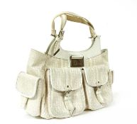 A Christian Dior white canvas pocket tote handbag