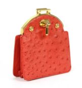 An Asprey deep coral coloured ostrich leather coin purse