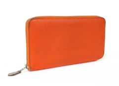 A vintage Hermès orange leather 'Azap' wallet,