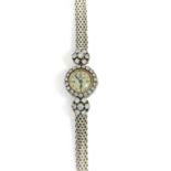 JAEGER LECOULTRE - ANNEES 40 - Petite montre bracelet de dame en or gris et [...]