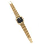 BAUME ET MERCIER - ANNEES 60 - Montre bracelet en or jaune 18k. - BOÎTIER : [...]