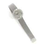 VACHERON CONSTANTIN - ANNEES 60 - Montre bracelet en or gris et diamants. - [...]