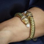 ATTRIBUE A LALAOUNIS - BRACELET LIONS DE MYCENE - Il et en forme de bracelet rigide [...]