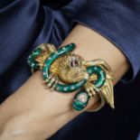 ANNEES 1850 - BRACELET AIGLE ET SERPENT - Le bracelet rigide ouvrant présente un [...]