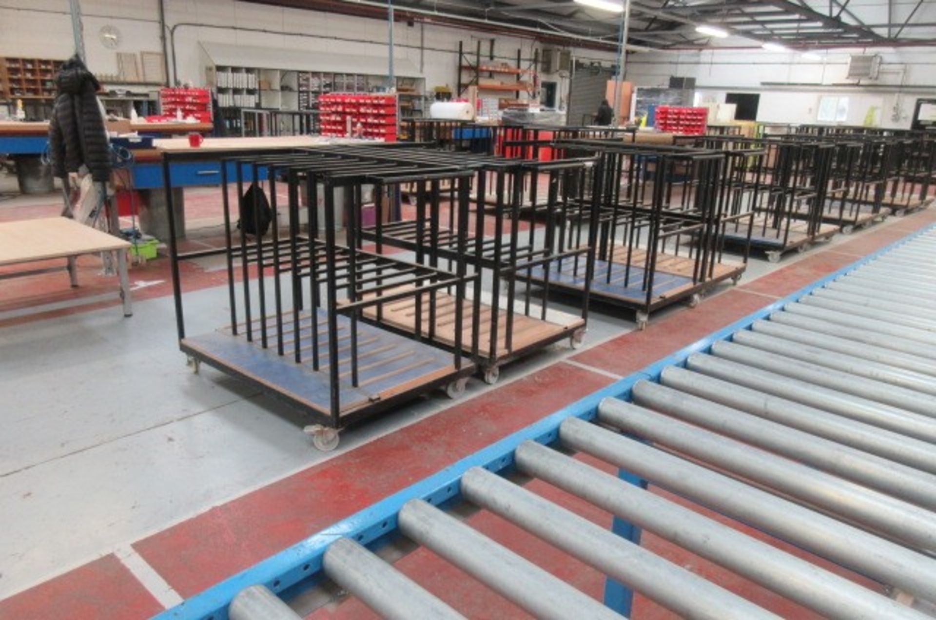 Five mobile assembly panel trolleys