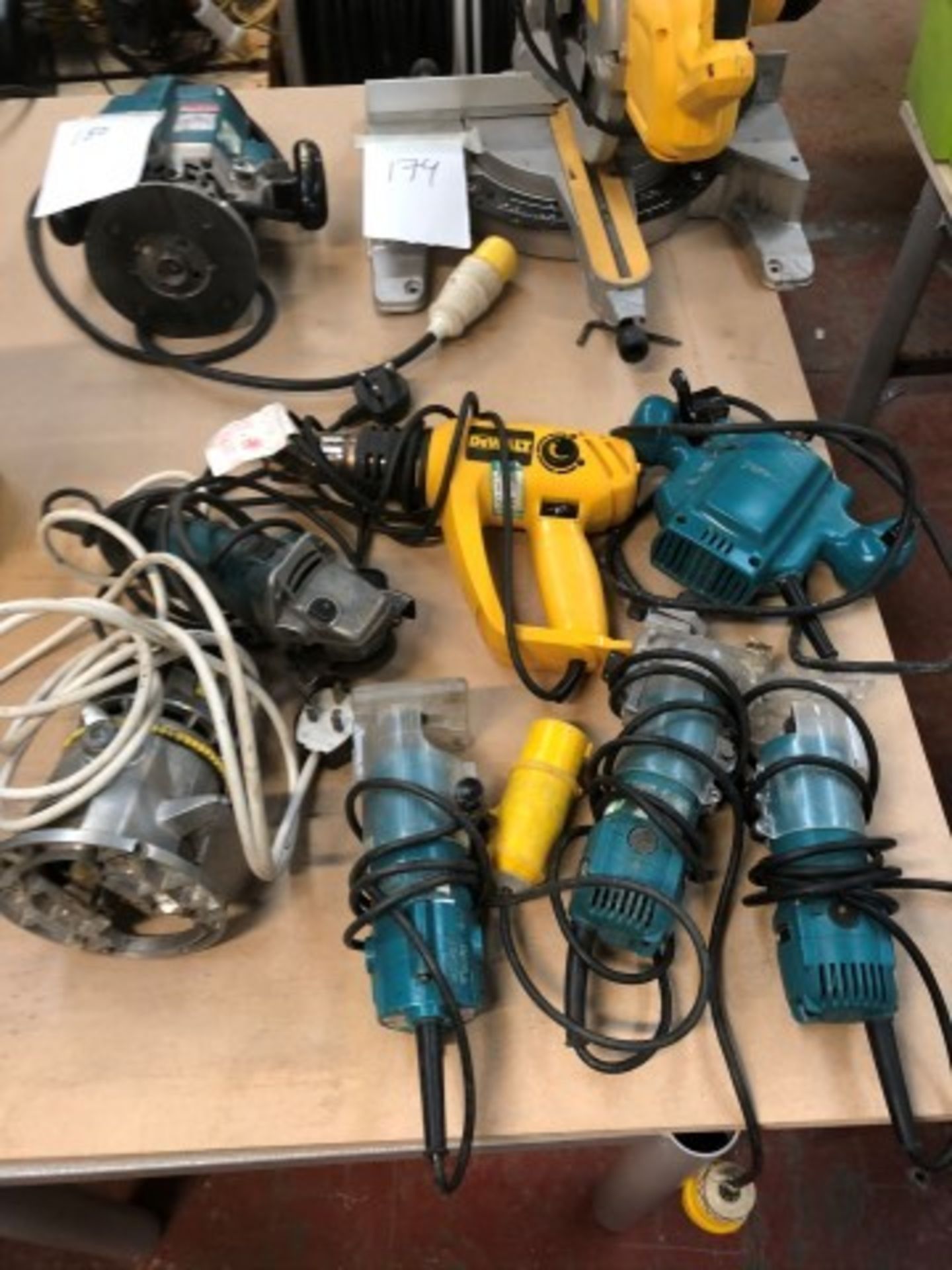 Quantity of power tools a(Transformer, Dewalt router 110v, Stanley router 240v, Makita 3" grinder 2