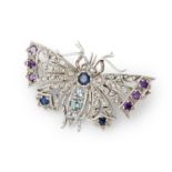 A multi-gem and diamond set brooch.