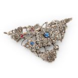 An early 20th century sapphire, ruby and diamond brooch.