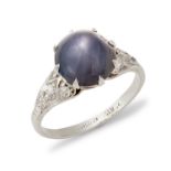 An early 20th century star sapphire and diamond ring.