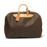 Louis Vuitton - a Monogram zipped suitcase.