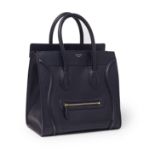 Celine - a navy blue leather Luggage tote bag.