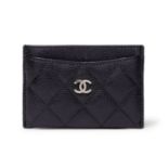 Chanel - a quilted Caviar leather card holder.