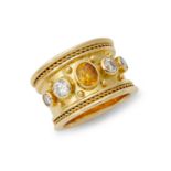 An 18ct gold citrine and diamond ring.