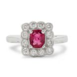 An 18ct white gold ruby and diamond cluster ring.