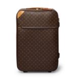 Louis Vuitton - a Monogram Pégase 65 rolling suitcase.