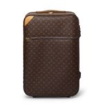 Louis Vuitton - a Monogram Pegase 65 rolling suitcase.