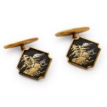 A pair of shakudo cufflinks.