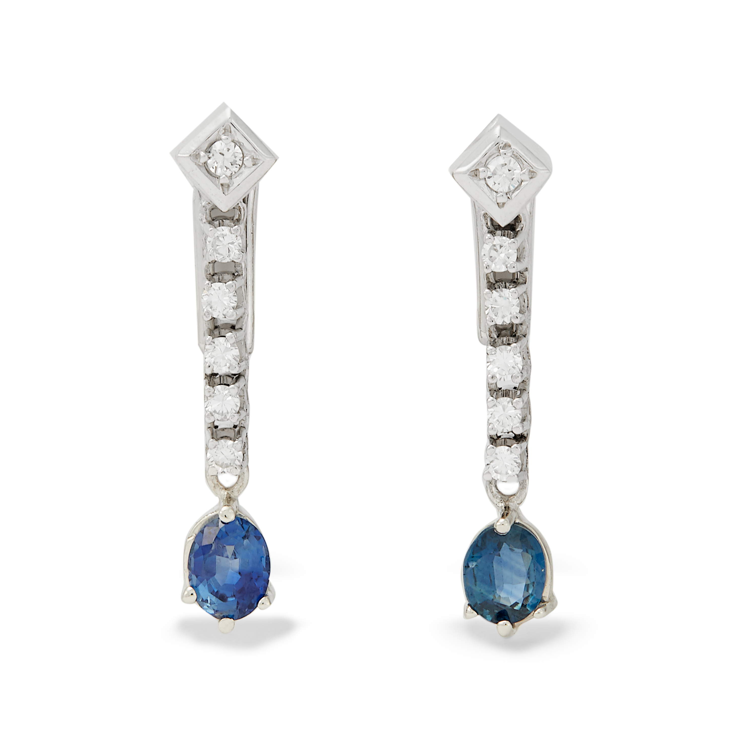 A pair of sapphire and diamond clip earrings.