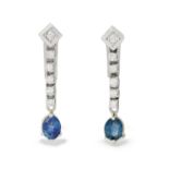 A pair of sapphire and diamond clip earrings.