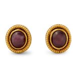 Ilias Lalaounis - a pair of 18ct gold and ruby stud earrings.