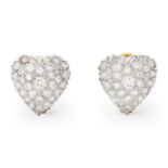 A pair of diamond stud earrings.