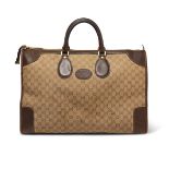 Gucci - a vintage GG canvas tote travel bag.