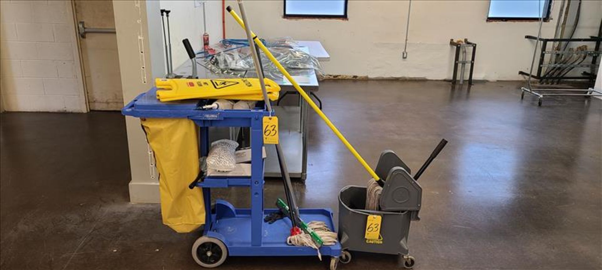 Misc. Cleaning Supplies, Global Industrial Cart, mops, bucket, and wet floor signs.
