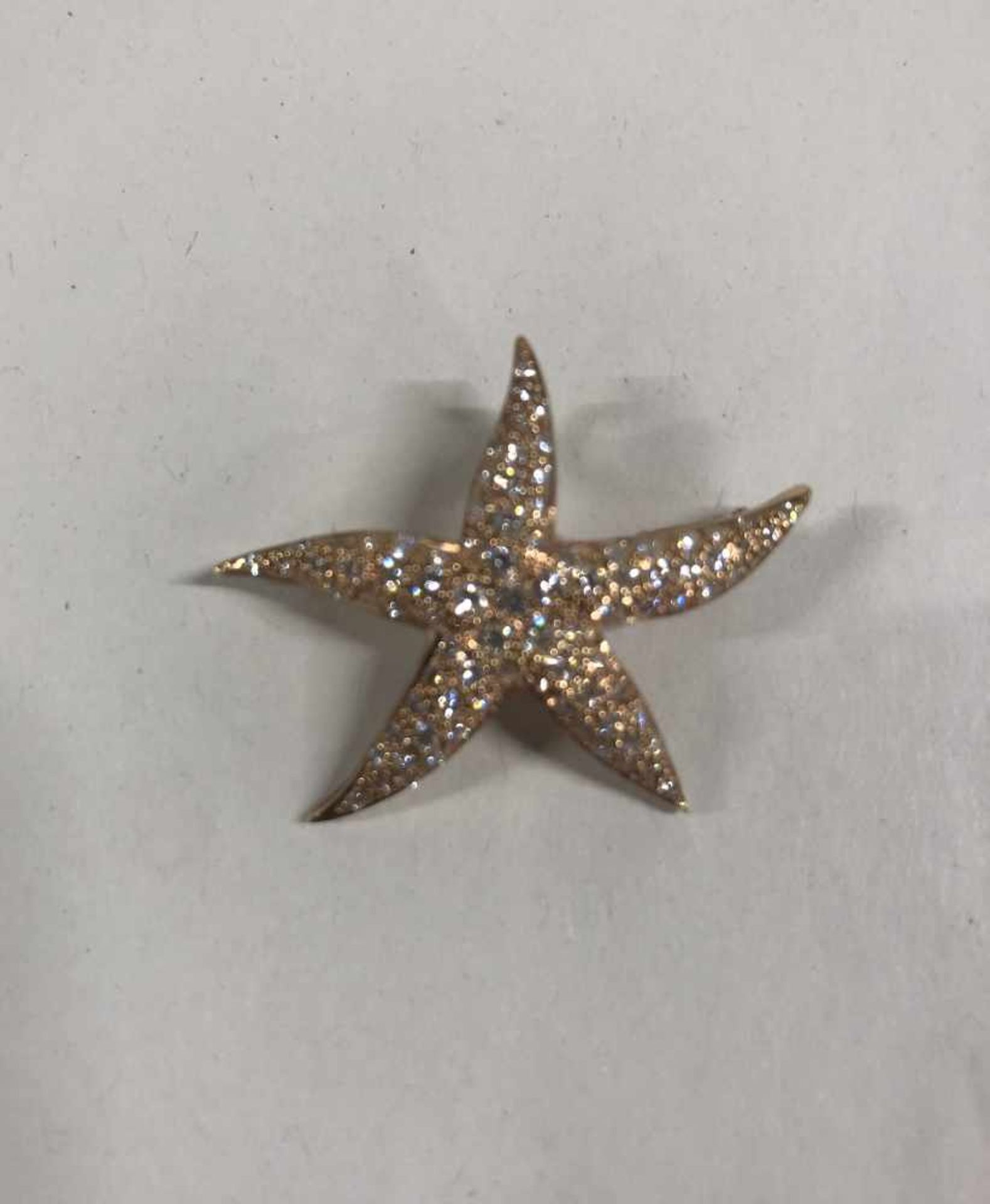 Broche Etoile de mer Baguettes et Diamants