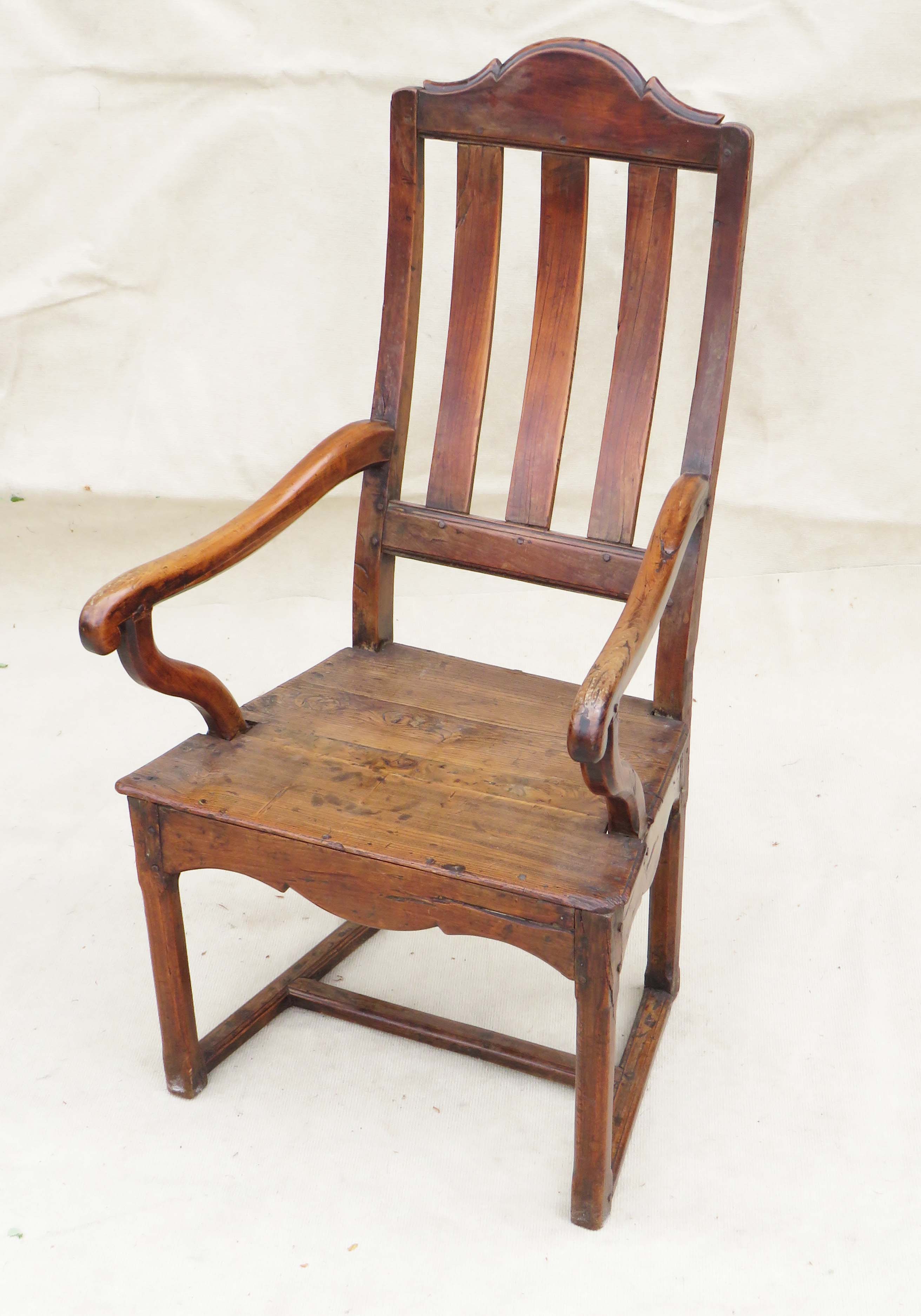 18th Century country armchair constructed from a selection of oak, yew, chestnut & fruitwood