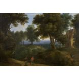 Flemish School, 17th century A wooded landscape in Flanders with sportsmen on a path, mounted