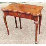 18th Century Georgian Mahogany Tea Table having well figured foldover top above one frieze drawer