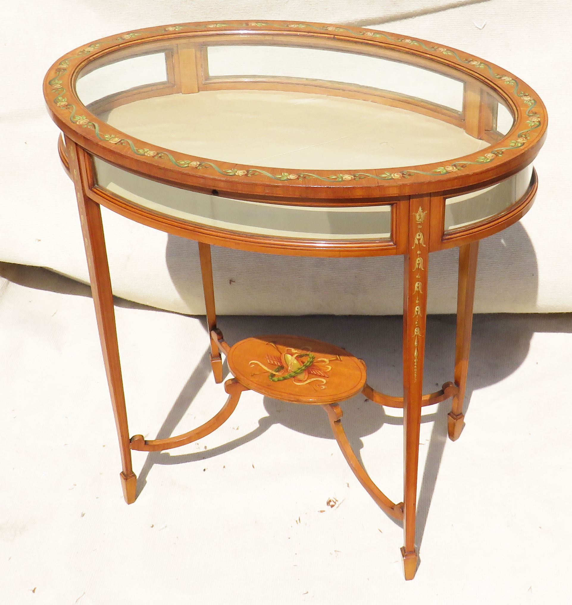 Late 19th Century satinwood oval bijouterie display table with painted & polychrome decoration,