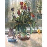 Pieter Jan de Clercq (1891-1964) Still life of tulips in a glass vase with a blue toy boat, trees