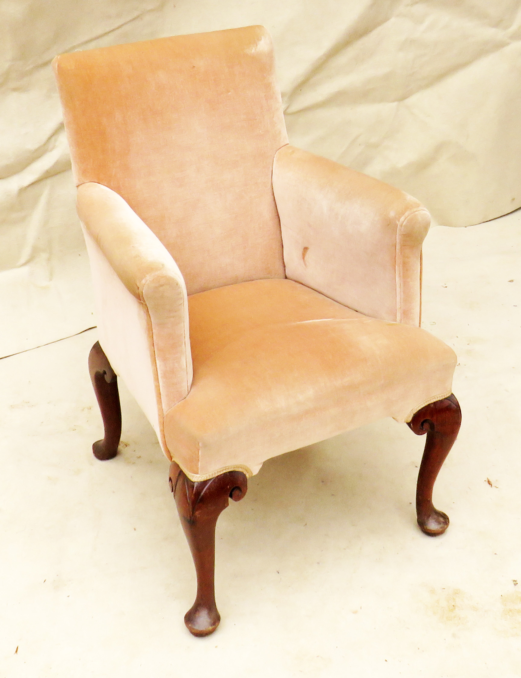 Georgian 18th Century Library Armchair raised on elegant mahogany carved cabriole legs unusually