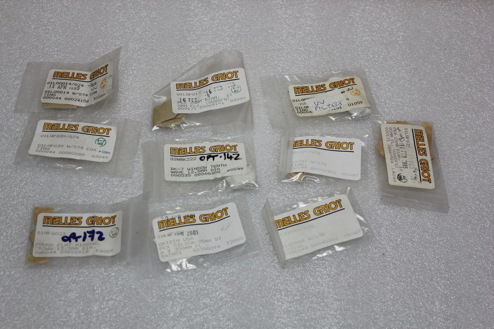 LOT OF NEW MELLES GRIOT LASER LENSES