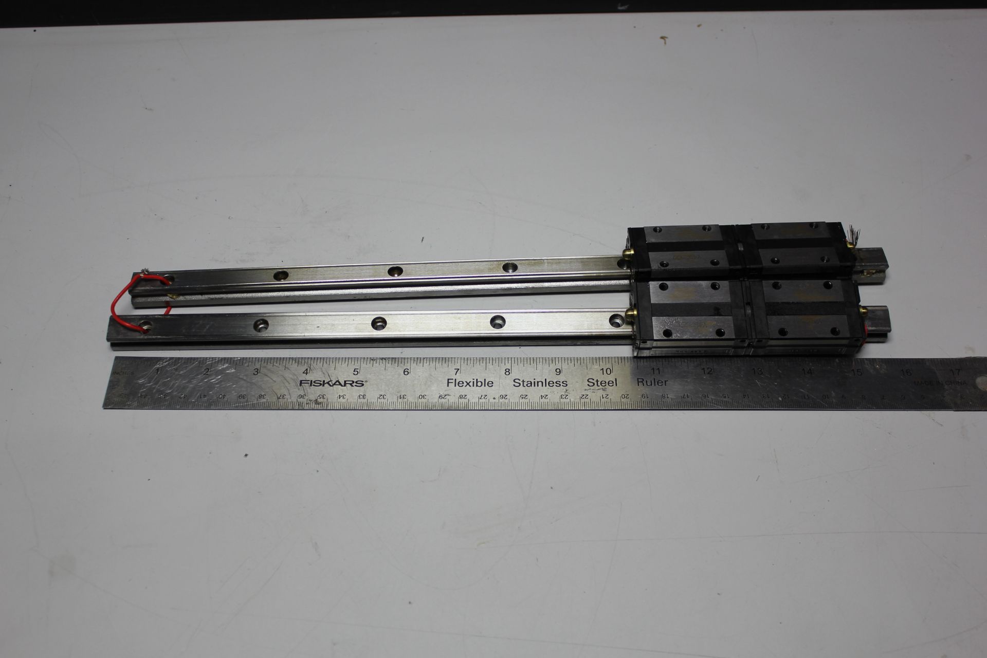 PAIR OF THK LINEAR RAILS WITH BEARING BLOCKS