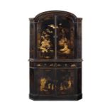 A Queen Anne style black japanned corner cupboard