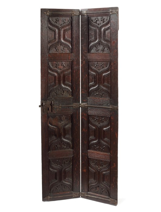 An oak six-panel folding door