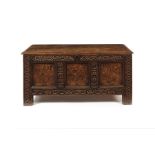A Charles II carved oak and marquetry panelled chest, Yorkshire