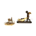 A Regency patinated bronze and gilt bronze pin cushion and a chamberstick and snuffer