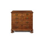 A Queen Anne walnut crossbanded and featherbanded chest