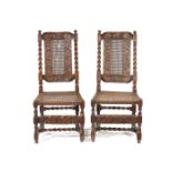 A pair of Charles II carved walnut side chairs